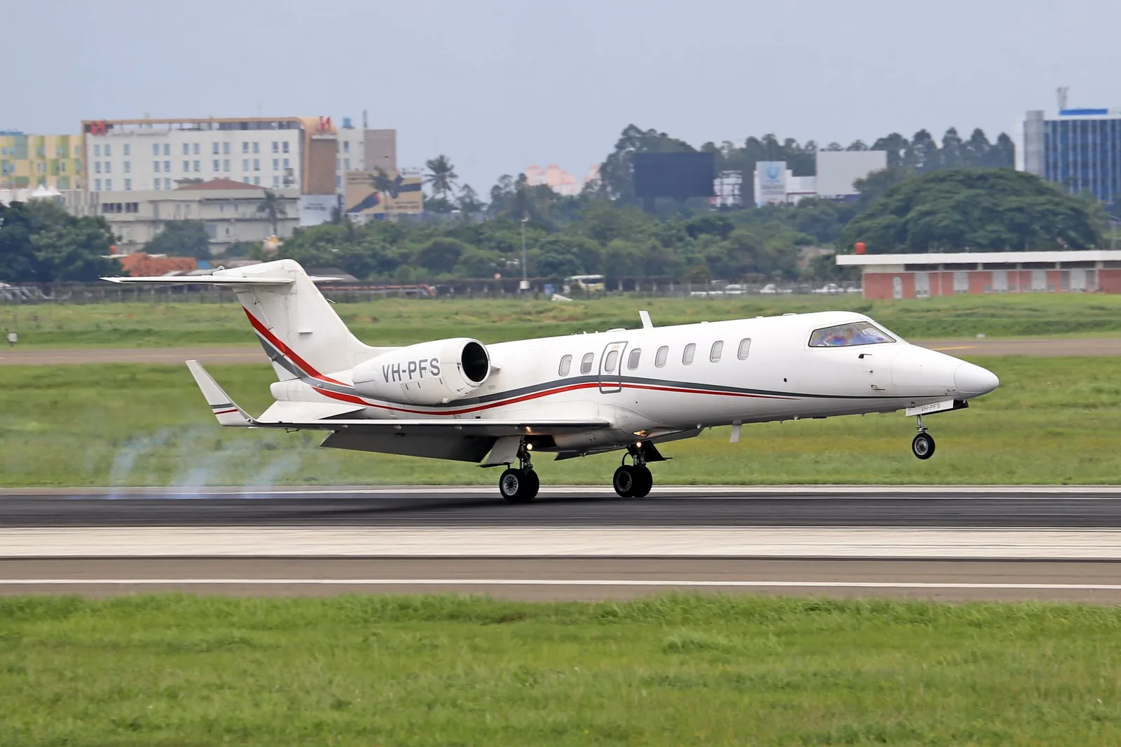 Private jet climbing into a clear sky